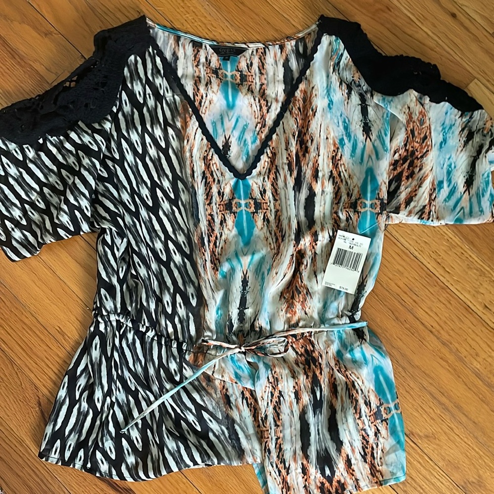 NWT GUESS chiffon top. Medium. Crochet trim at shoulder. Tie detail at hem